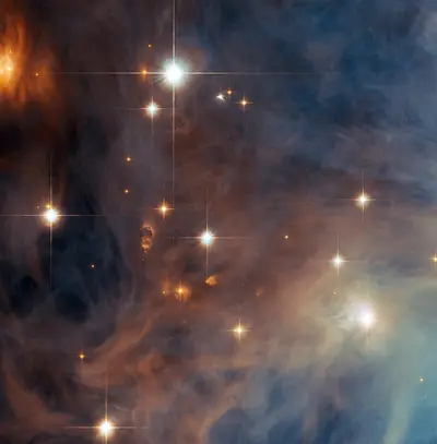 Der De-Mairan-Nebel Messier 43 (NGC 1982) im Orion, ein leuchtender Teil der Orionnebel-Region, aufgenommen vom Hubble-Weltraumteleskop.